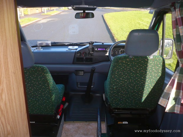 The cab, complete with panoramic view and swivel seats.
