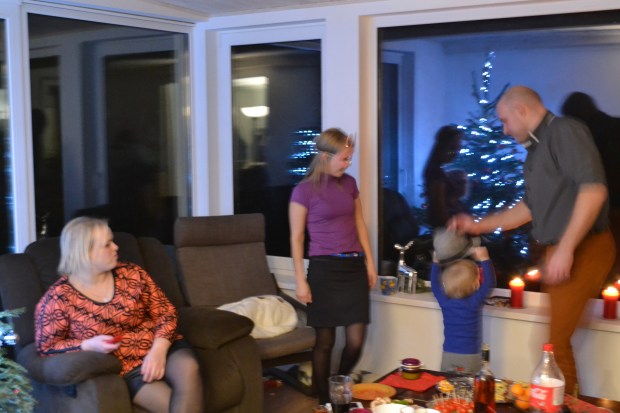 Our conservatory in full swing with Christmas Day dancing. Featured IKEA items include POANG chair, INGOLF stool (as end table) and STOCKHOLM & VINTER 2014 cushions.